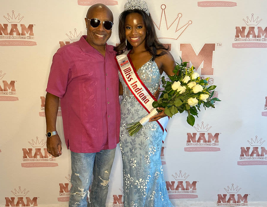 Coach Blair with a student pageant winner